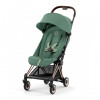 Коляска прогулочная Cybex Coya Rosegold Leaf Green с бампером и дождевиком