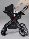 Автокресло Amarobaby Motus 0+ (0-13 кг) с адаптерами черный